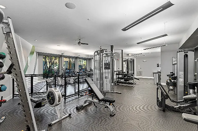 24/7 fitness center with cardio and strength training equipment