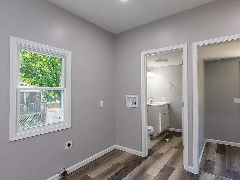 Back of house powder room, Washer and dryer hook up and back door.