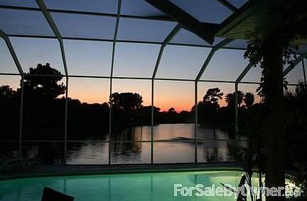 View of lake from screened patio.