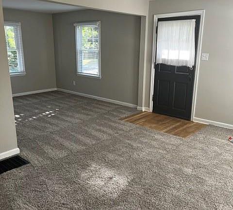 Family Room with front door view.
