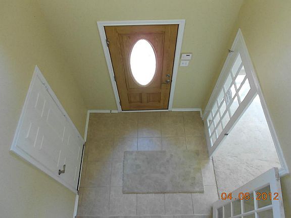 Welcoming two story Entry has New Front Door & Hardware & Tile Floor.