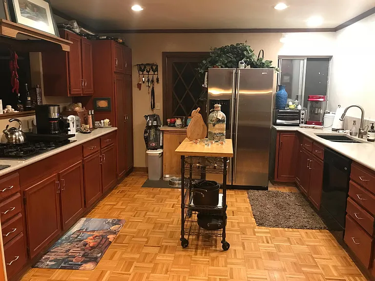 Kitchen with two full Refrigerator/freezers
