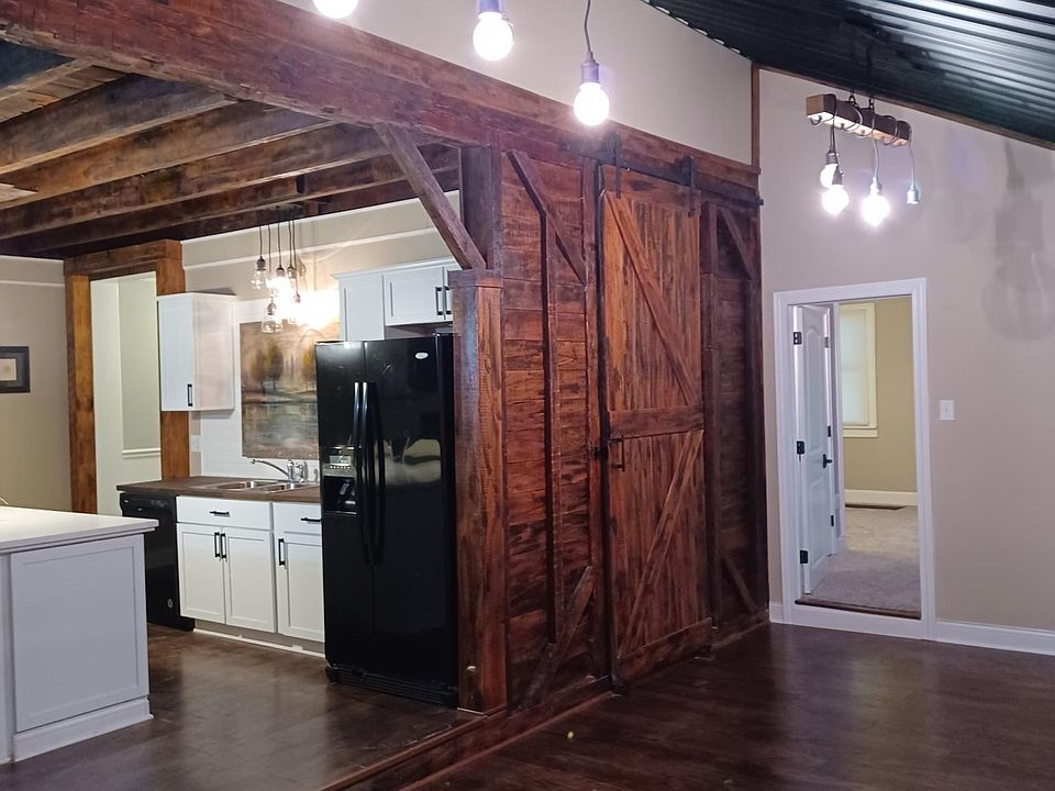 Another view of vaulted great room seeing into the newly created master suite