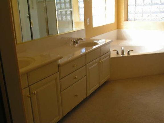 Double Sinks, Garden Tub In Master Bath