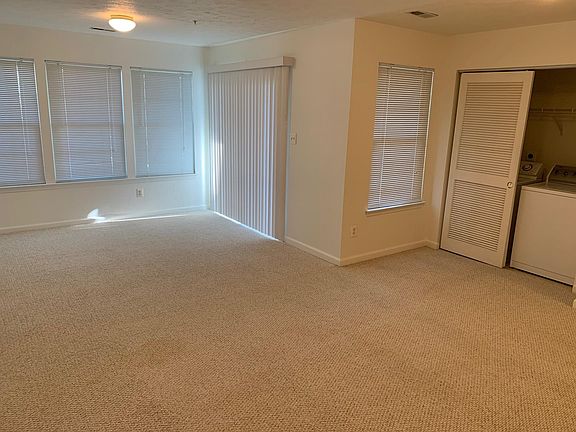 Clubroom to outside with washer and dryer