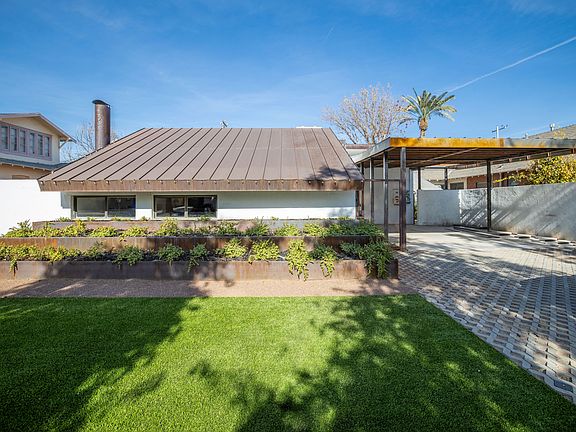 front carport view. parking for 4 cars off the street