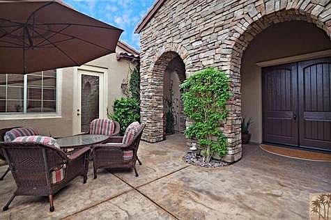 Front courtyard offers a perfect place for morning tea and conversation away from the squeals and shrieks coming from the back yard.