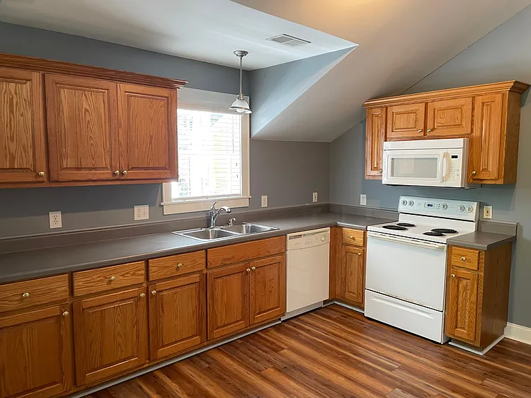 Updated kitchen with all of the modern appliances and lots of cabinet space!