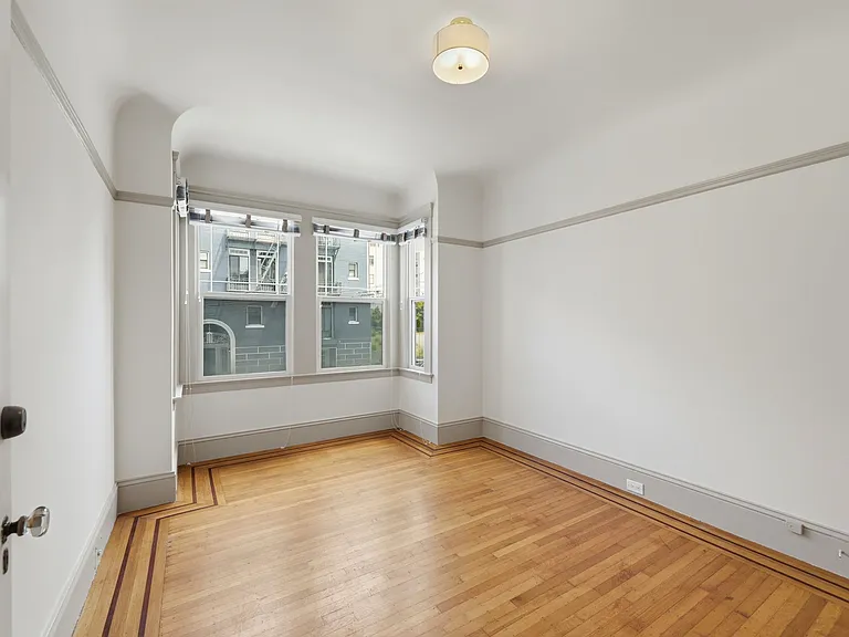 2nd spacious bedroom with view to the front of the unit