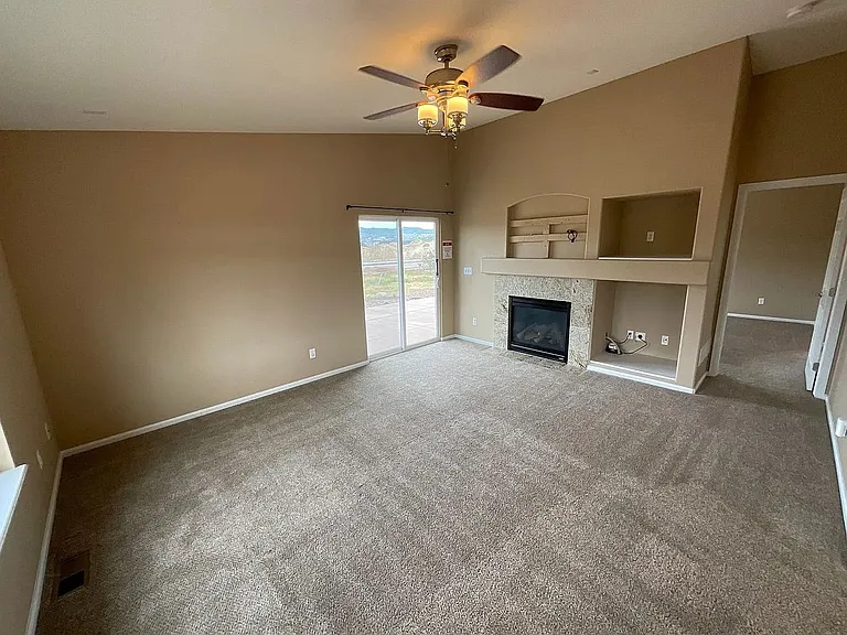 Comfy living with gas fireplace and patio access!
