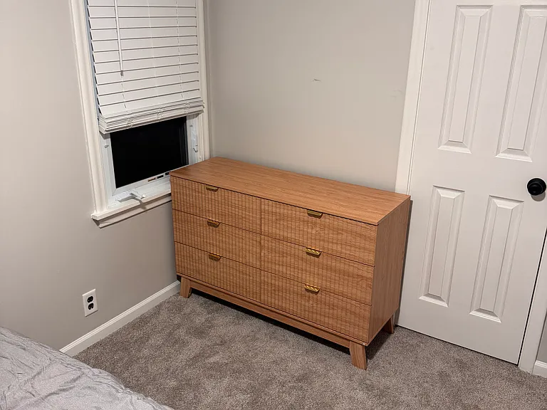 Cabinet can certainly be moved for improved accessibility to window