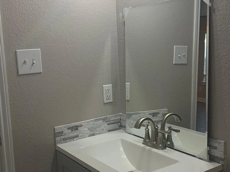 Bathroom has been finished, photos show while it was under renovation