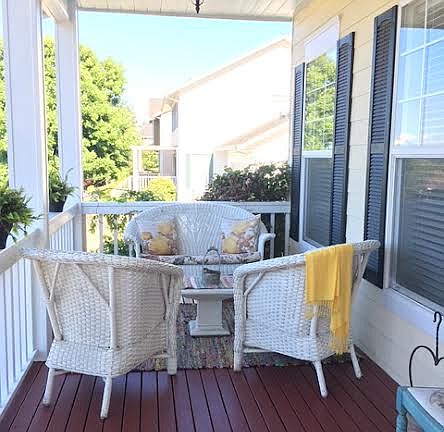 Full width front porch seating.