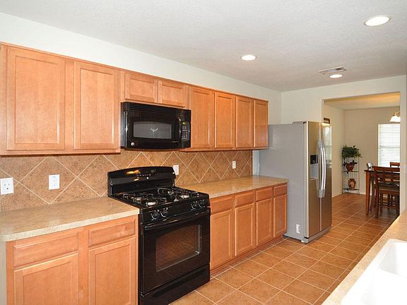 Kitchen will not disappoint. Plenty of counter space for any occasion. Plenty of cabinets for storag