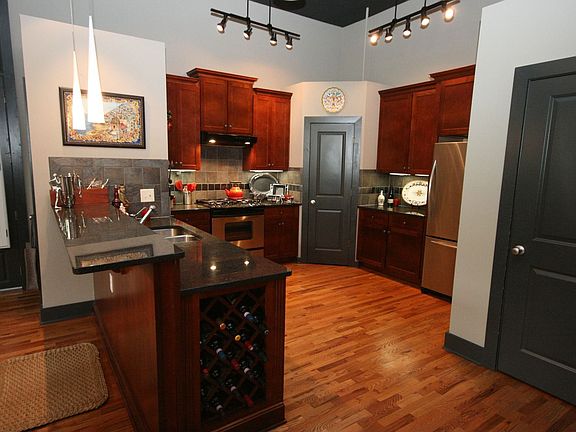 Granite counters, stainless appliances, wine rack