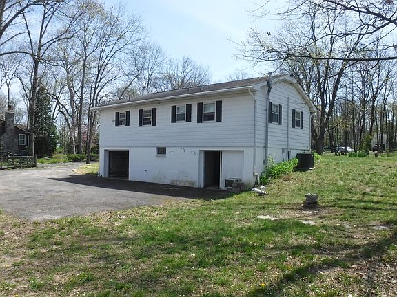 back of house garage and walk out basement door
