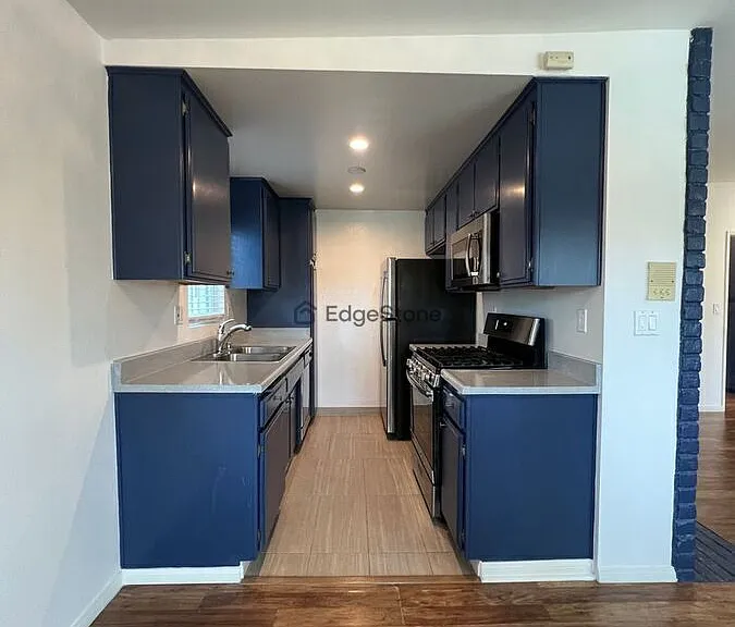 11905 Avon Way #202 — Photo 4