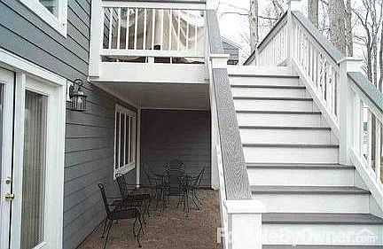 Stamped concrete patio and steps to deck