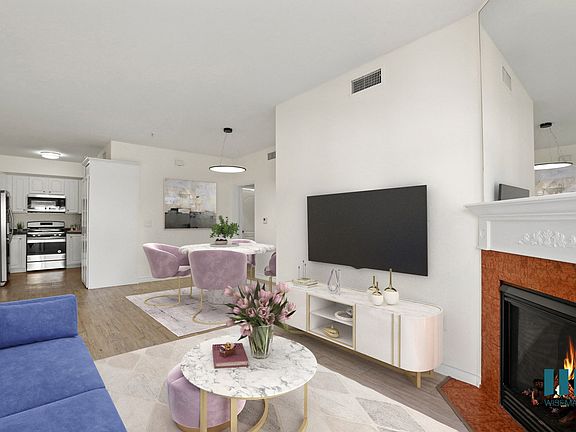Kitchen, Dining, and Living Room with Electric Fireplace