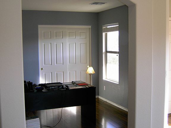 Den is the 4th Bedroom and can be closed off.