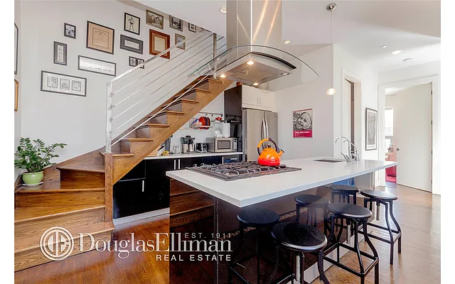 Sold by Douglas Elliman | media 12