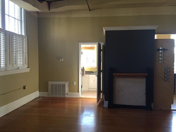 View of living room and door to bathroom