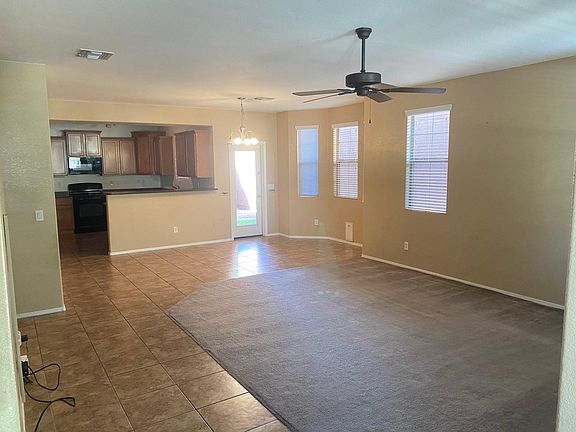 Downstairs Living Room with ceiling fan