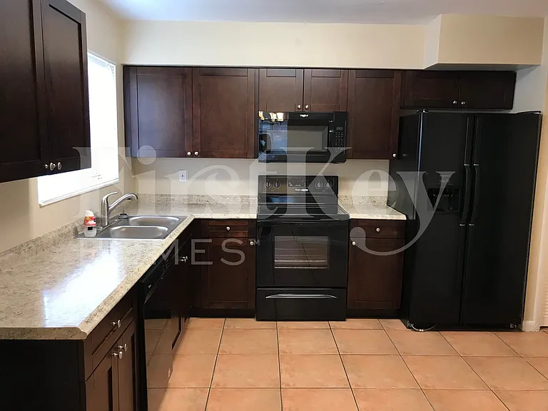 4896 NW 6th Ct — Photo 9