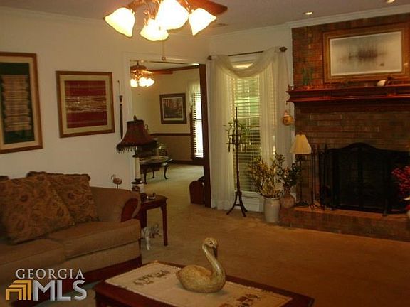 FAMILY ROOM FLOWS INTO EXTRA LARGE DEN/LIBRARY