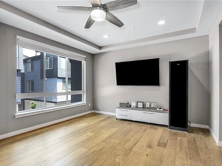 Main floor living area with 70" TV.