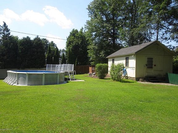 Heated pool with pool house