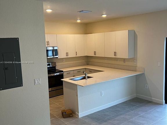 2nd image of 11444 W 33rd Ct #11444