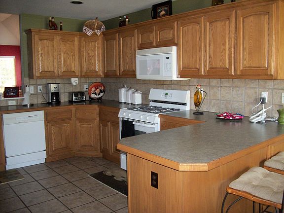Lots of cabinets! Open to Dining Room and Living Room