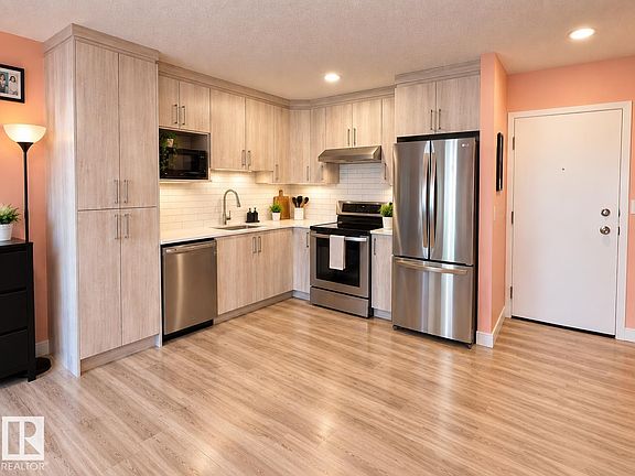 2nd image of 2624 Mill Woods Rd E #108
