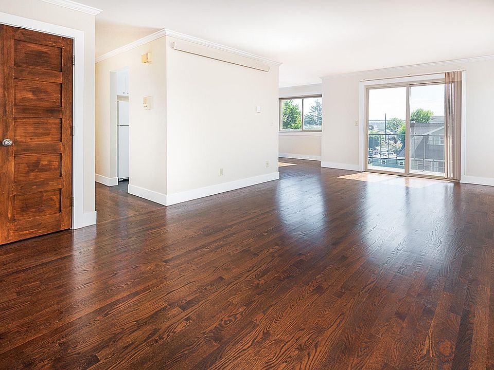 Huge living room with real hardwood floors