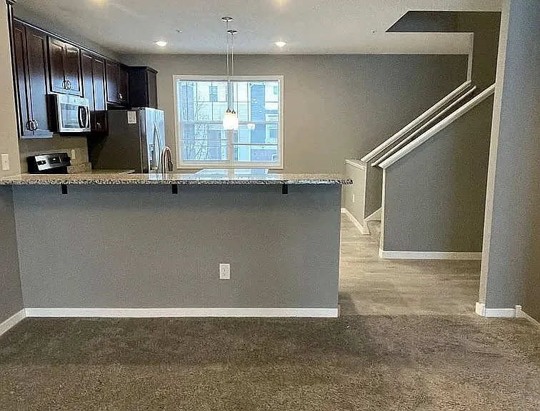 Step into modern living at LS Capital Group, featuring a spacious open layout with a sleek kitchen and inviting atmosphere. Perfect for relaxation and entertaining, this home offers comfort and convenience. Schedule your visit today!