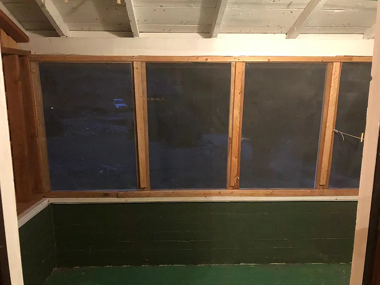 View of screened in porch (it's a tiny porch)