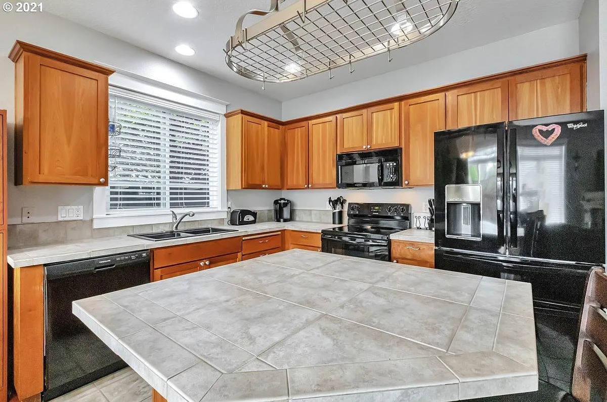 4933 SW Wentworth Ter — Photo 4