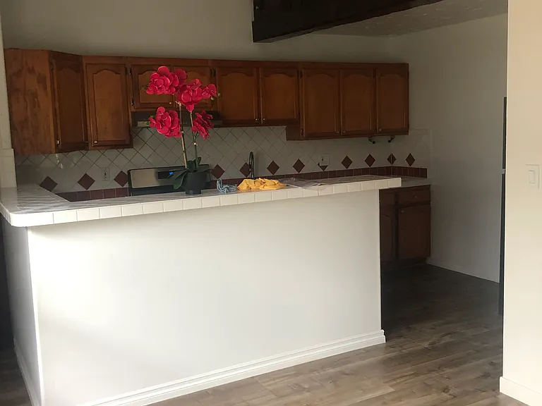Kitchen view from living room space