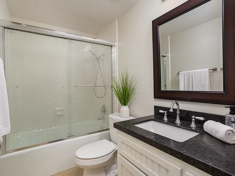 Refresh in a bathtub in the 2nd bathroom. It is located on the other end of the house between the two bedrooms.