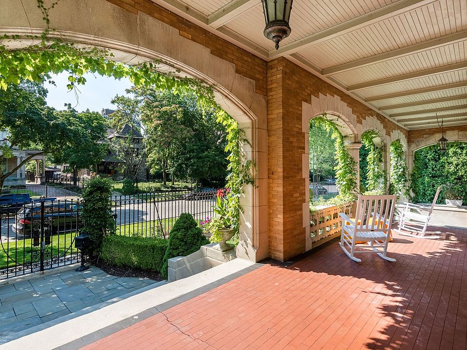 The broad front porch welcomes guests and provides a beautiful respite from the late afternoon sun.
