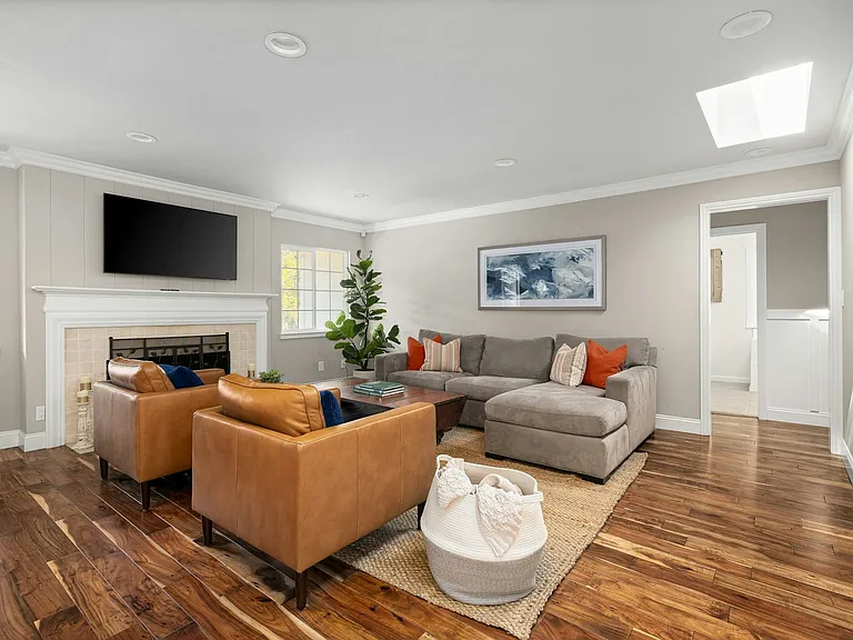 Bright spacious living room with skylights