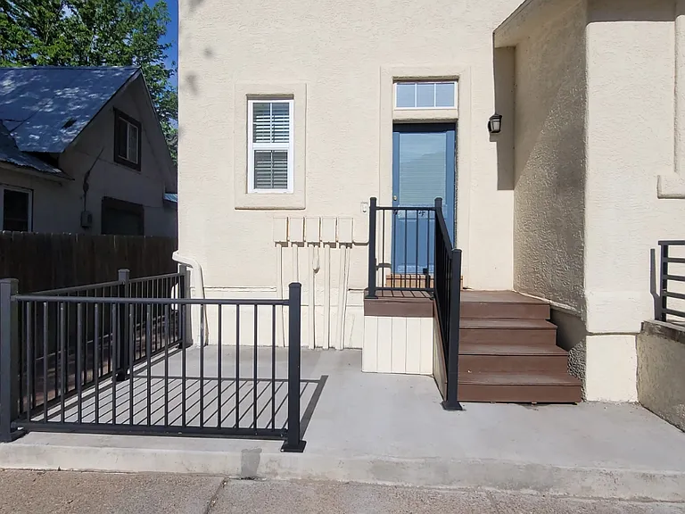 Back of house, entry to apartment