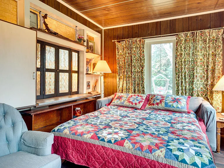 Sun porch pull out queen for quests at Ian's Place Watersmeet Mi Vacation Rental
