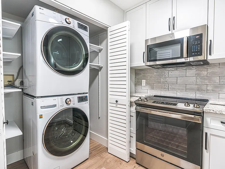 New full size washer and dryer with pantry and storage