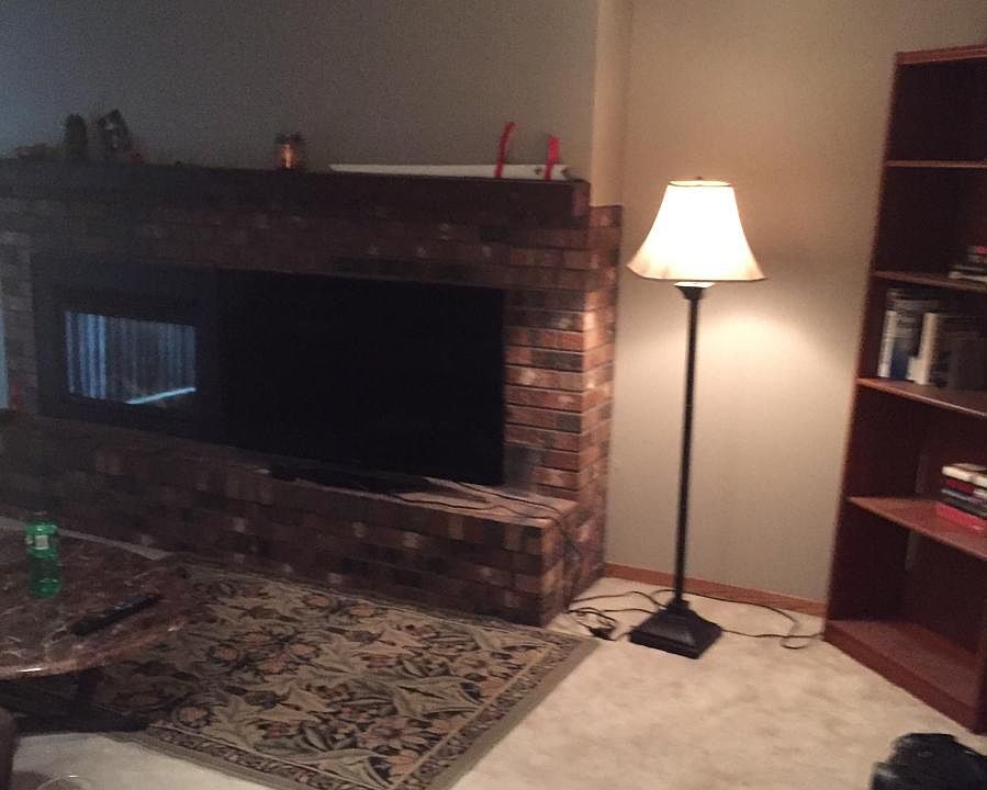 Living room with gas fireplace.