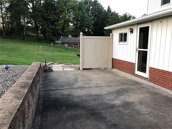 rear back patio which leads into the pantry/mudroom