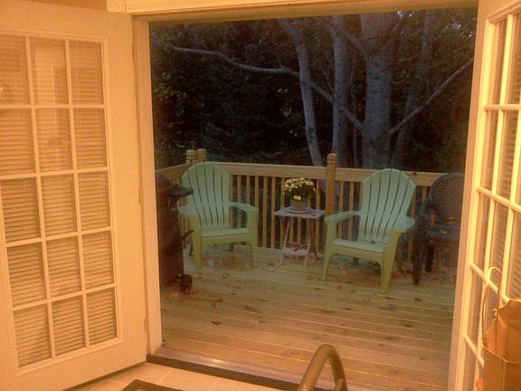 French Doors off kitchen lead to brand new deck