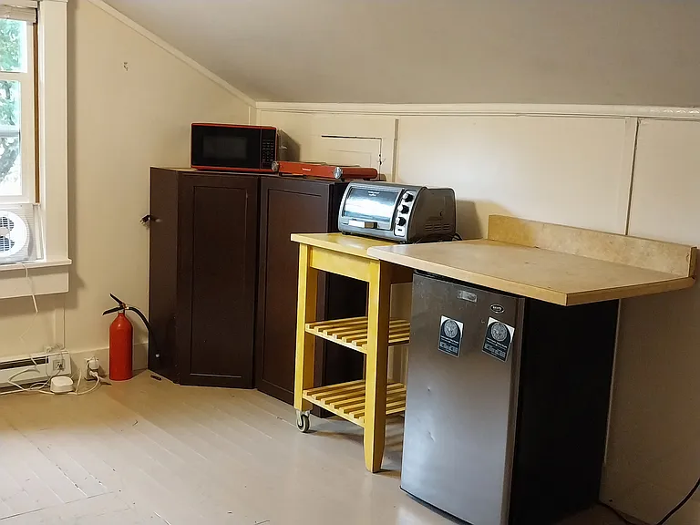 refrigerator, toaster oven, microwave & storage for snacks
