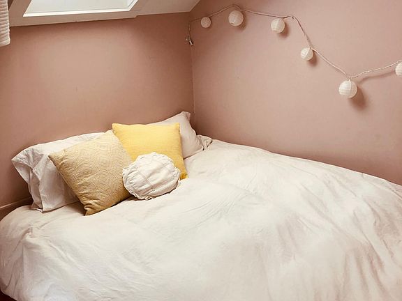 Bedroom 1 Queen bed and skylight